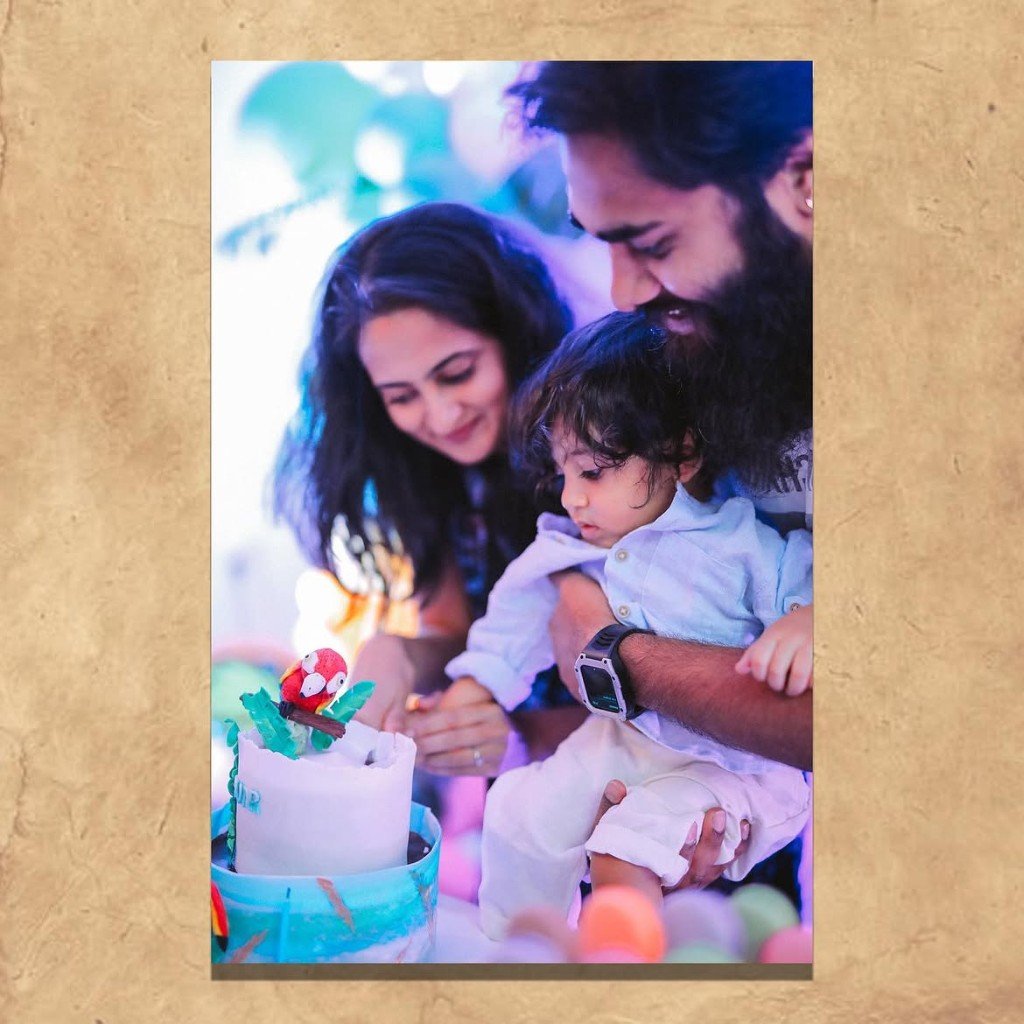 Family celebrating around a birthday cake