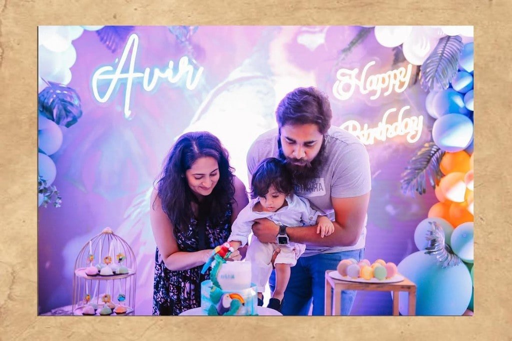 First birthday celebration with neon signs and cake