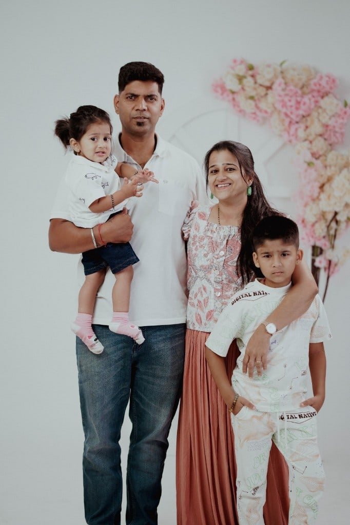 Family studio portrait with a toddler