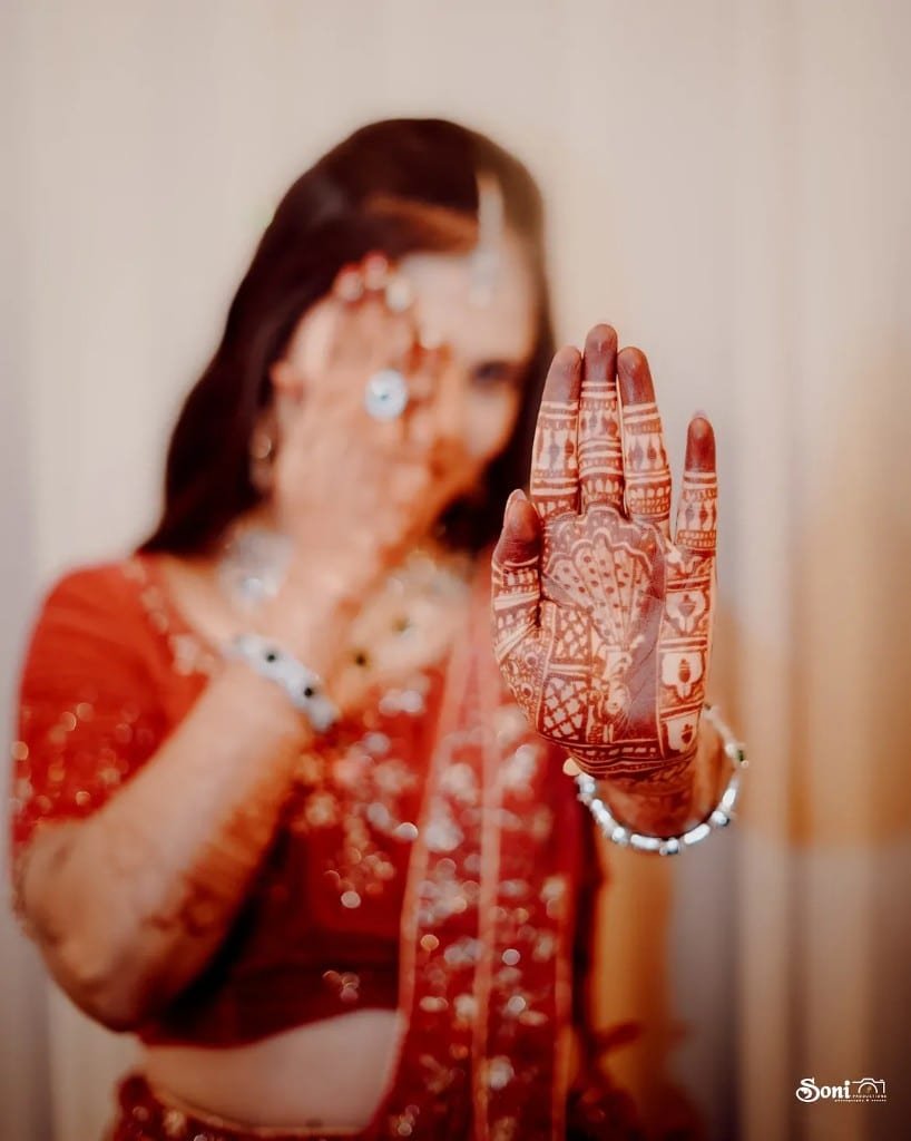 Bridal mehendi close-up with peacock motif