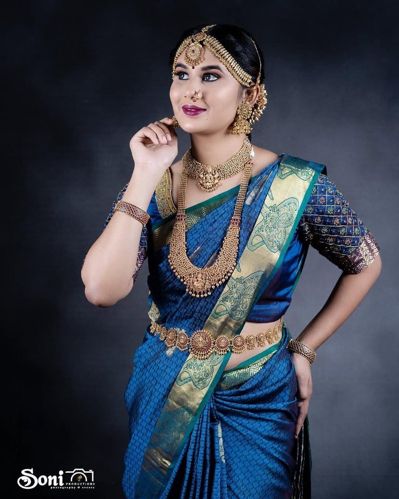 Bridal makeup portrait in a royal blue saree