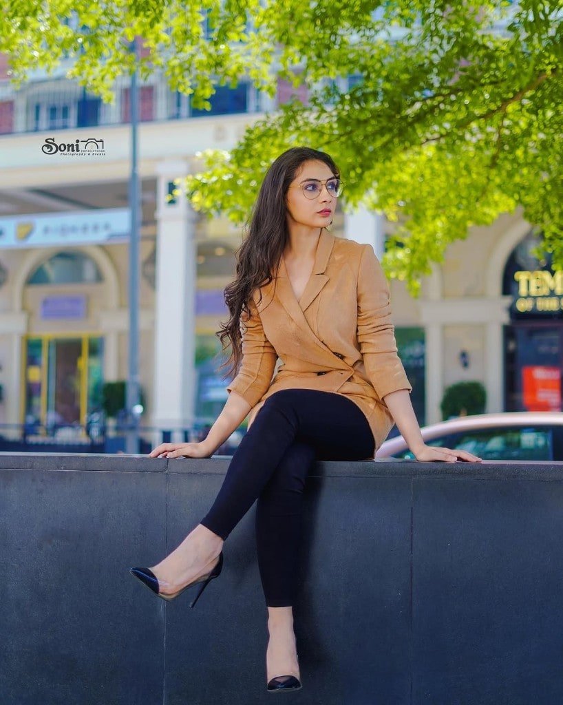 Outdoor fashion portrait in a camel blazer