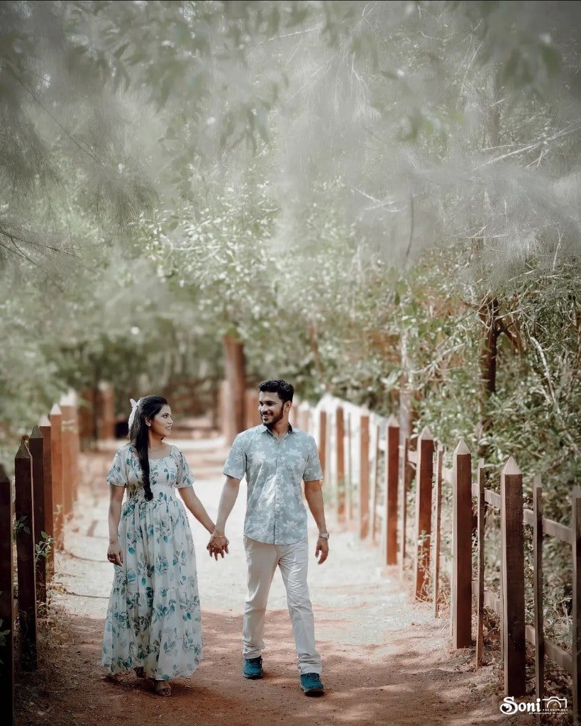 Couple walking a wooded path