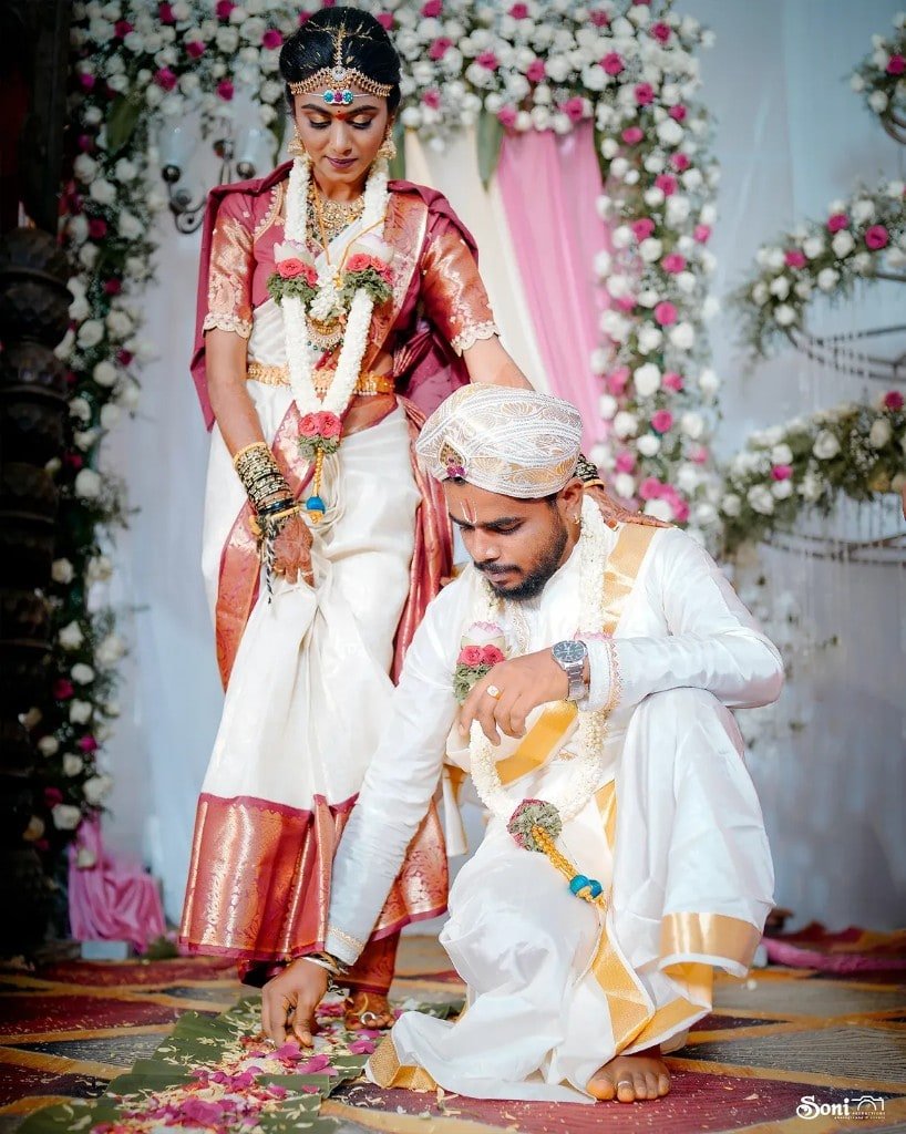 Traditional wedding ritual at the bride’s feet