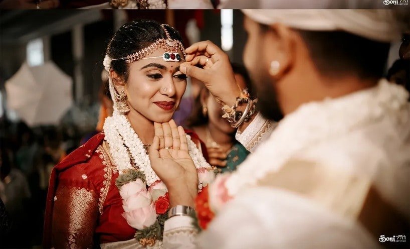 Wedding tilak — an intimate ceremony moment