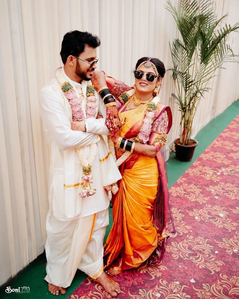 Playful wedding portrait with sunglasses