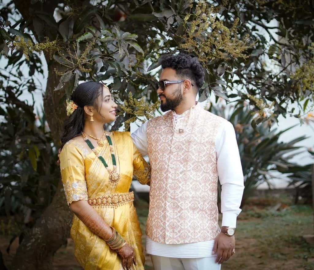 Wedding couple in traditional gold attire
